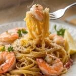 a plate of garlic butter shrimp pasta