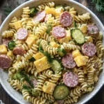 a bowl of dill pickle salami and cheese pasta salad