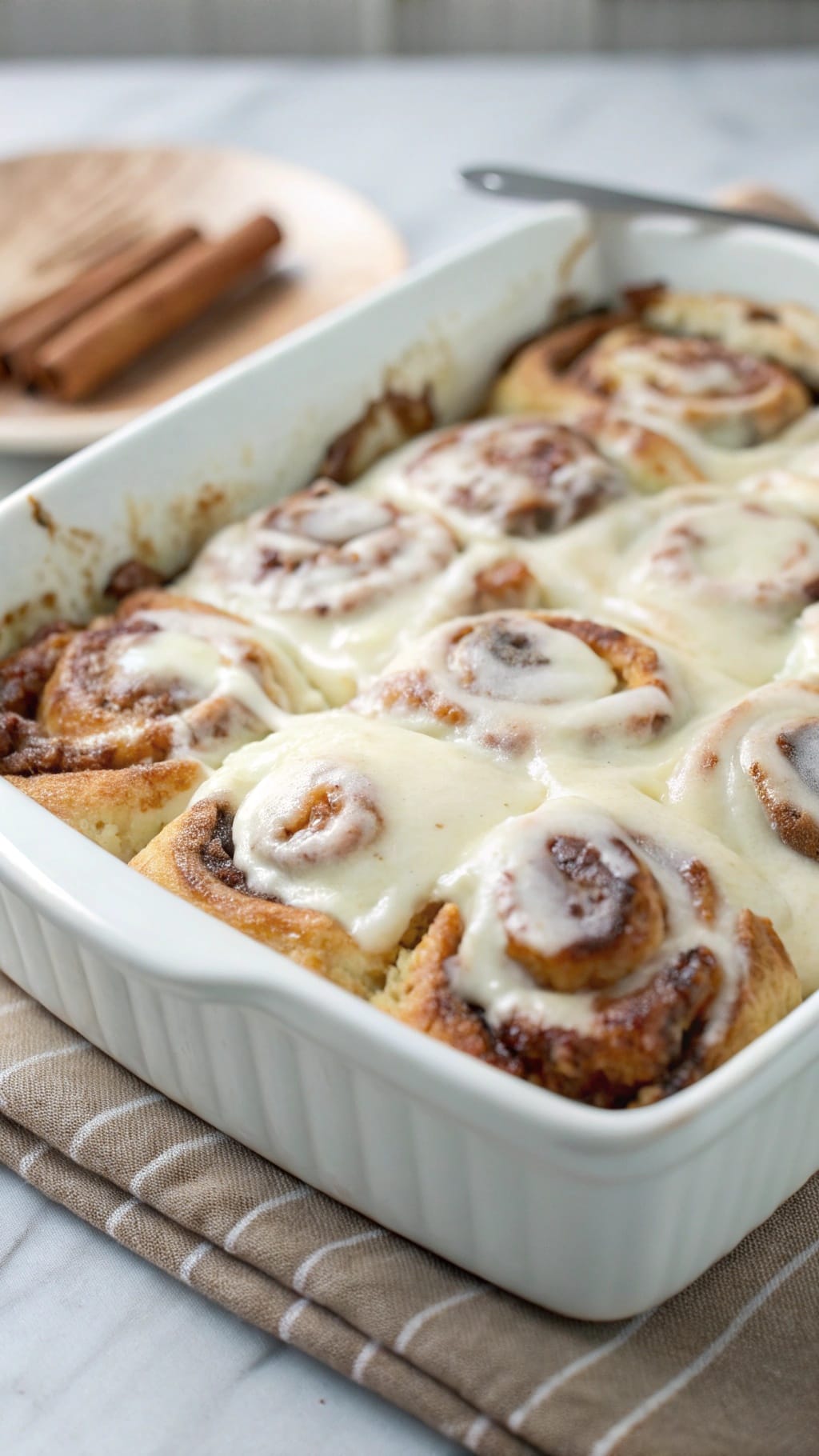 25 Delicious Christmas Breakfast Ideas for a Festive Morning 2 A delicious Cinnamon Roll French Toast Bake topped with icing.