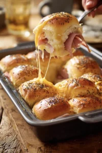 The Ultimate Ham and Cheese Sliders on Hawaiian Rolls 7 ham and swiss cheese sliders 24